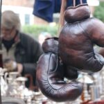 Boxing gloves hanging in a street market