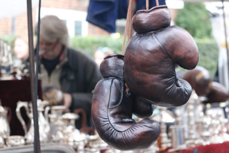 Boxing gloves hanging in a street market